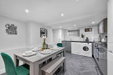 Kitchen or kitchenette, Dining area, dishwasher, washing machine