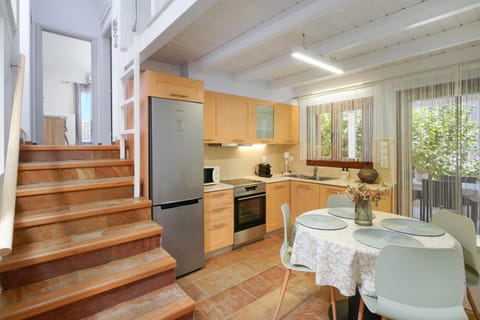 Dining area, dishwasher, oven, stove, kitchen