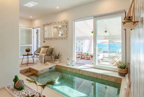 Living room, Photo of the whole room, Pool view, Sea view, Swimming pool