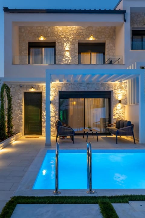 Property building, Facade/entrance, Garden, Swimming pool, Sunset