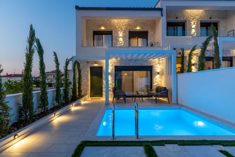 Property building, Facade/entrance, Garden, Swimming pool, Sunset