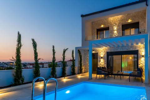 Property building, Facade/entrance, Garden, Swimming pool, Sunset