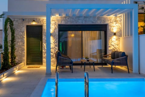 Property building, Facade/entrance, Garden, Swimming pool, Sunset