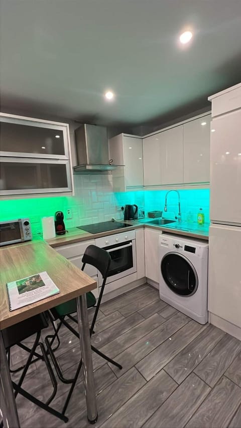 Kitchen or kitchenette, Living room, Seating area, Dining area, oven, washing machine, kitchen