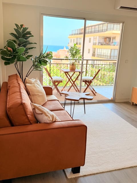 View (from property/room), Balcony/Terrace, Living room, Seating area, Beach, Beach, Sea view