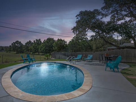 Patio, BBQ facilities, Garden, Seating area, Swimming pool, Sunset