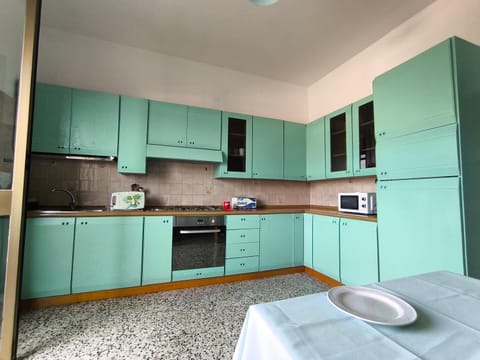 Kitchen or kitchenette, oven, stove