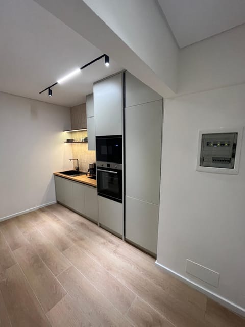 Kitchen or kitchenette, oven, stove