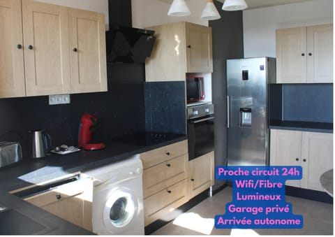 Kitchen or kitchenette, dishwasher, oven, stove