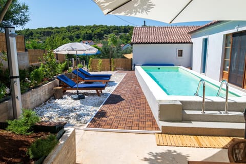 Property building, Patio, View (from property/room), Pool view, sunbed