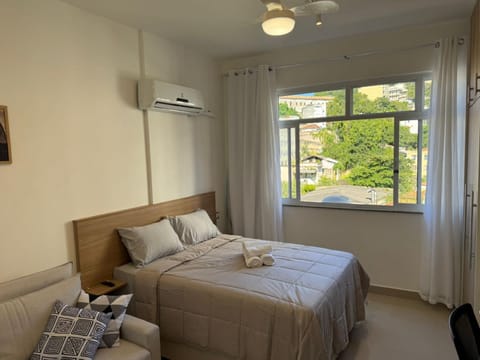 Bed, Photo of the whole room, Bedroom, towels, air conditioner