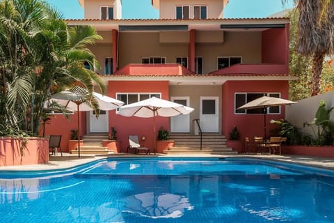 Property building, Patio, Day, View (from property/room), Balcony/Terrace, Pool view, Swimming pool, sunbed