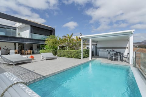 Property building, Living room, Swimming pool