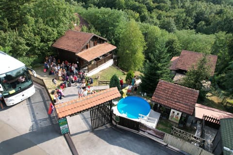 Property building, Natural landscape, Bird's eye view, Swimming pool, group of guests