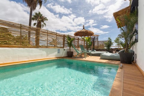 Property building, Living room, Swimming pool