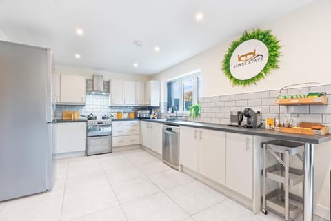 dishwasher, microwave, stove, toaster, kitchen