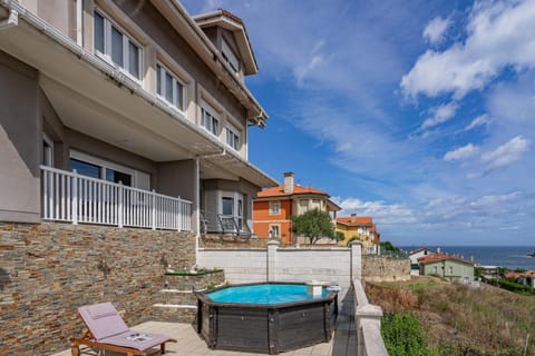 Property building, Living room, Swimming pool