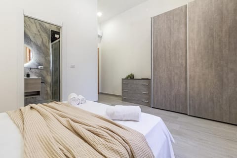 Bed, Photo of the whole room, Bedroom, towels, wardrobe