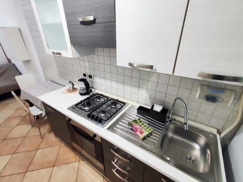 Kitchen or kitchenette, stove
