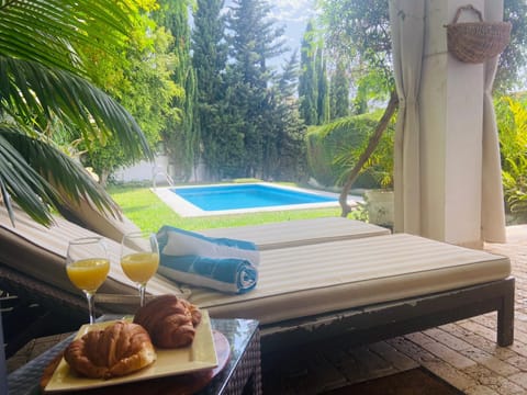 Day, Natural landscape, Garden, Garden view, Pool view, Swimming pool, sunbed, towels
