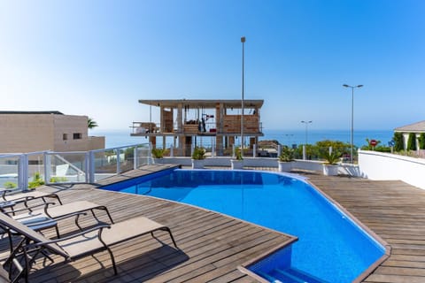 Property building, Living room, Swimming pool