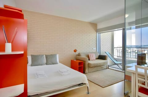 Bed, Living room, Seating area, Bedroom