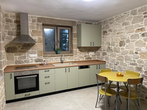 Dining area, stove, kitchen