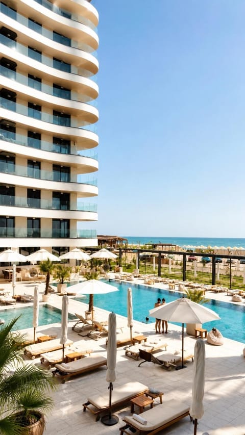 Property building, Communal lounge/ TV room, Day, Natural landscape, View (from property/room), Balcony/Terrace, Beach, Pool view, Sea view, Swimming pool, sunbed