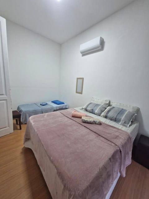 Bed, Photo of the whole room, Bedroom, towels, air conditioner