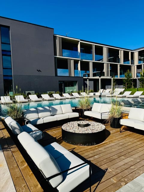 Property building, Day, Pool view, Swimming pool, sunbed