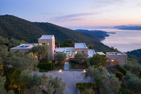 Property building, Natural landscape, Bird's eye view, Mountain view, Sea view, Sunset