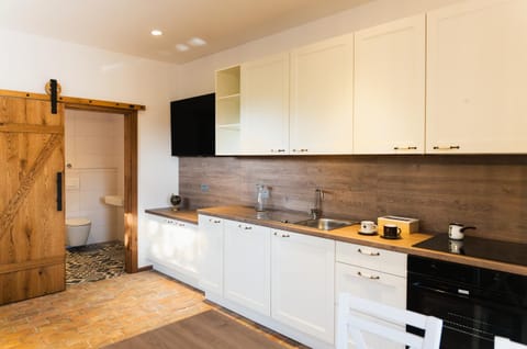 Kitchen or kitchenette, Living room, minibar, stove