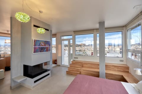 Property building, TV and multimedia, Living room, Seating area, Landmark view, Landmark view, fireplace, fireplace
