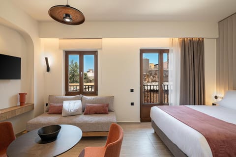 Bed, TV and multimedia, Living room, Photo of the whole room, Seating area, Evening entertainment, Bedroom