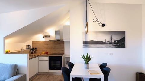 Kitchen or kitchenette, Living room, Seating area, Dining area, stove