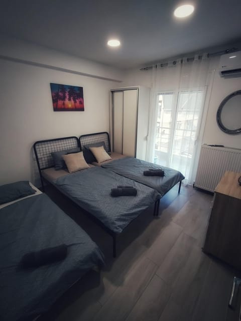 Bed, Photo of the whole room, Bedroom, towels, air conditioner