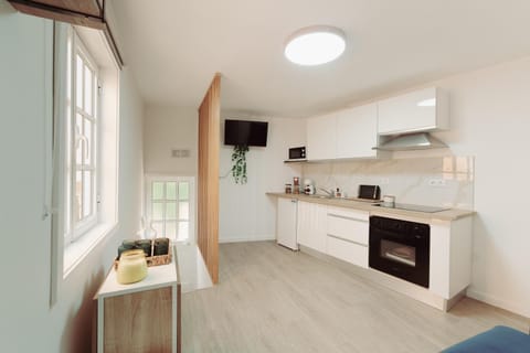 Kitchen or kitchenette, oven, stove