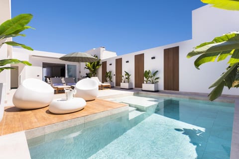 Patio, Day, Natural landscape, Pool view, Swimming pool, sunbed