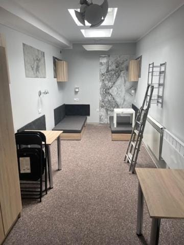 Property building, Kitchen or kitchenette, Living room, Seating area, Dining area, Parking