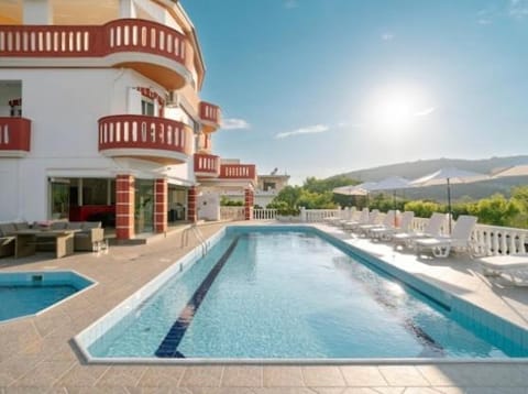 Property building, Natural landscape, Pool view, Swimming pool