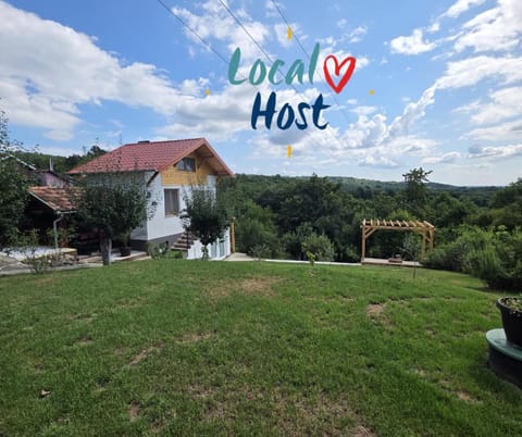 Property building, Spring, Day, Property logo or sign, Natural landscape, Garden, Logo/Certificate/Sign, Text overlay, Garden view, Mountain view, Certificate/Award