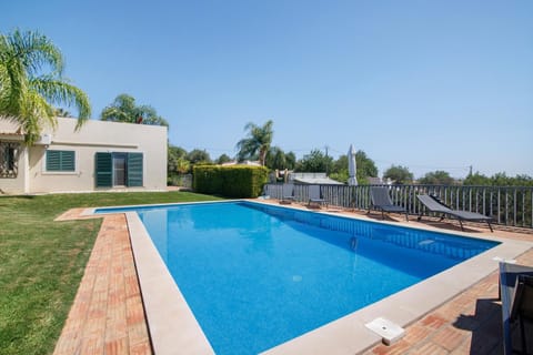 Property building, Living room, Swimming pool