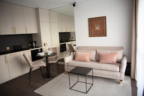 Kitchen or kitchenette, Living room, Seating area, Dining area