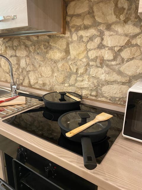 Kitchen or kitchenette, stove