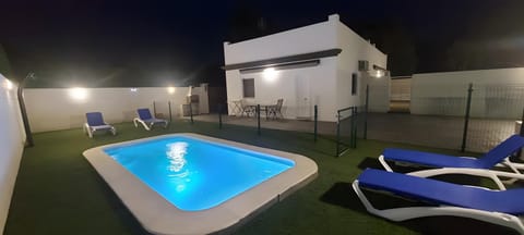 Property building, Living room, Swimming pool