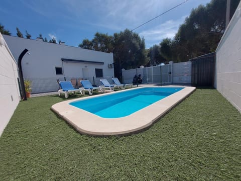 Property building, Living room, Swimming pool