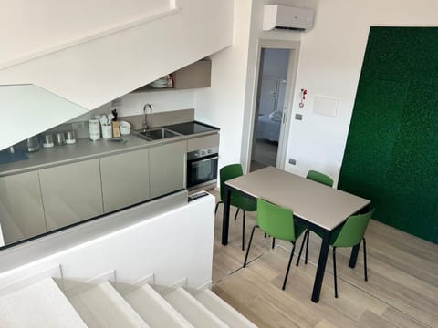 Kitchen or kitchenette, Living room, Seating area, Dining area, stove