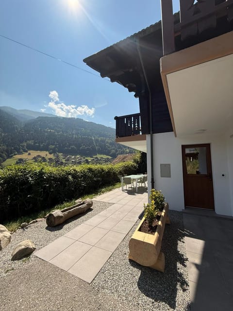 Property building, Spring, Day, Natural landscape, Mountain view