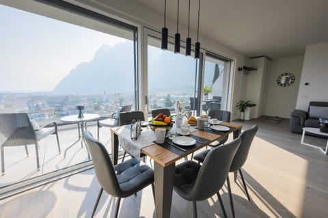 Natural landscape, View (from property/room), Living room, Dining area, Lake view, Mountain view