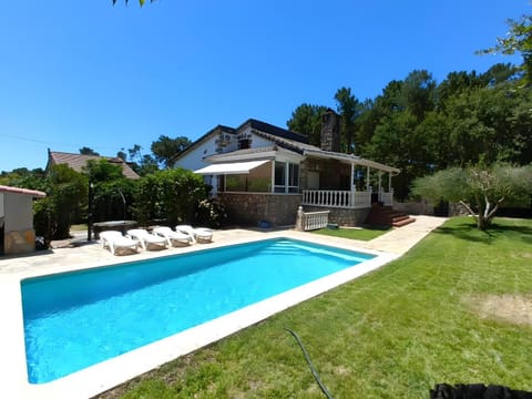 Property building, Living room, Swimming pool